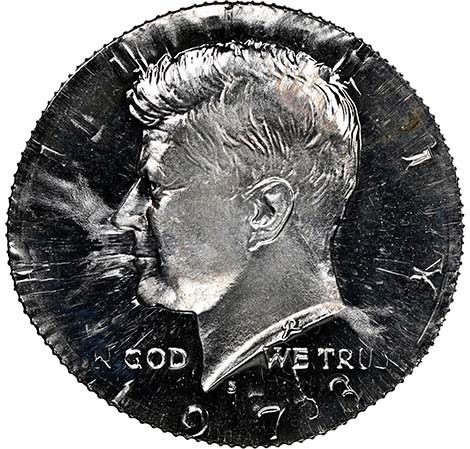 Kennedy Half Dollar double denomination error overstruck on Washington Quarter showing both coins' designs simultaneously